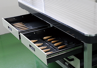 Generous storage space for tools in the upper drawer.